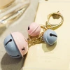Wholesale of creative and personalized jelly-colored bell keychains, car pendants, claw machine dolls, and women's bag pendants Application Scenario