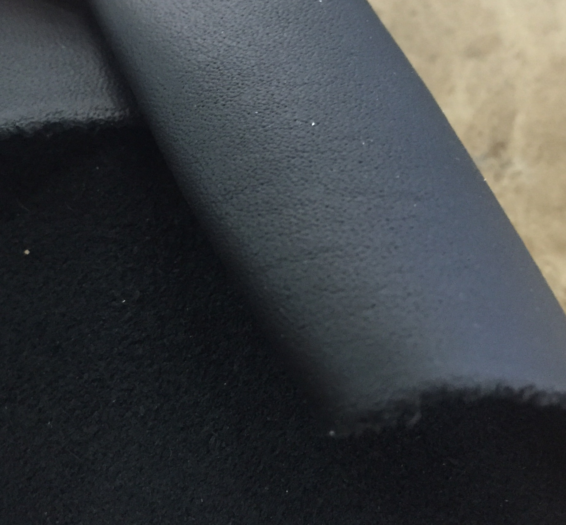 Yiwu genuine black cowhide top layer cowhide, car leather black pinhole car steering wheel cover cowhide Item Picture