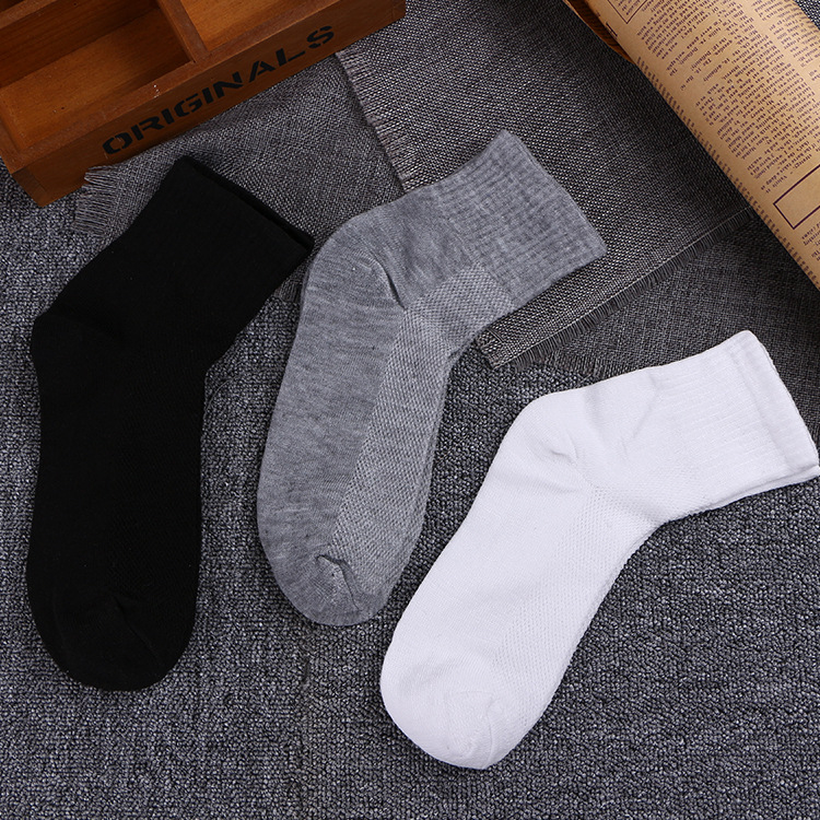 Wholesale men's socks, spring and summer mesh thin polyester-cotton mid-calf socks, business solid color casual socks, street stall supply