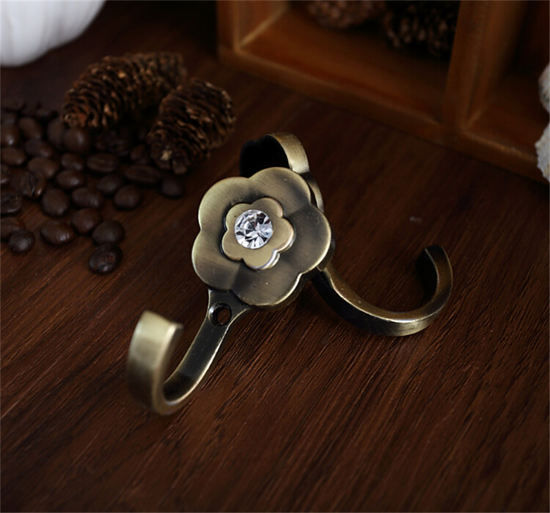 厂家生产直销合金窗帘墙钩窗帘绑带钩壁钩挂勾衣帽钩单钩窗帘配件产品图