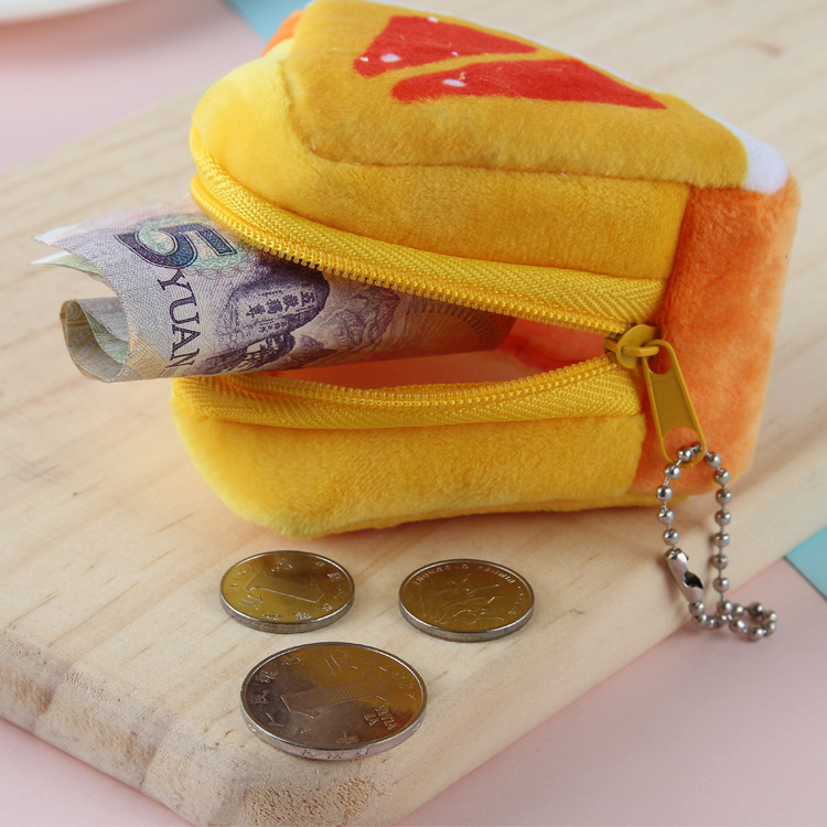 Creative plush three-dimensional triangular fruit coin purse, coin case, key case and pendant for children's festival gifts Application Scenario