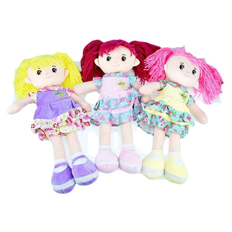 A cute girl in a double-layered floral dress in blue, pink and purple, with a doll as a toy gift, is crossing the border Item Picture