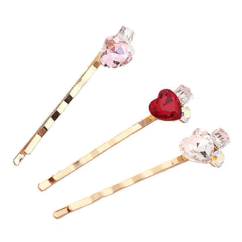 Wholesale of Korean-style crystal hair clips, hair accessories, one-piece clips, gold-plated colored heart-shaped patches, heart-shaped edge clips, and bangs clips Item Picture