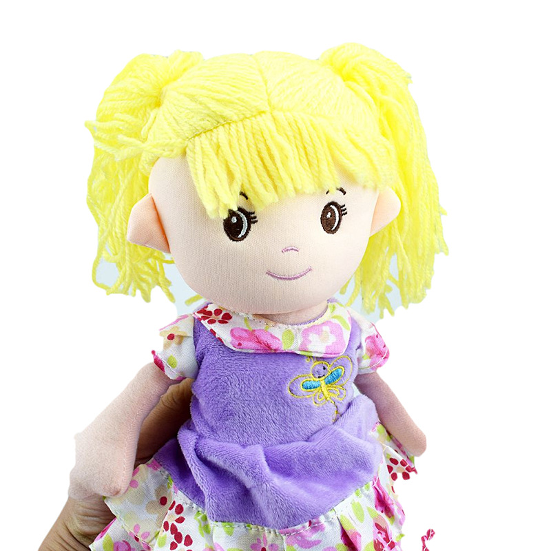 A cute girl in a double-layered floral dress in blue, pink and purple, with a doll as a toy gift, is crossing the border Application Scenario