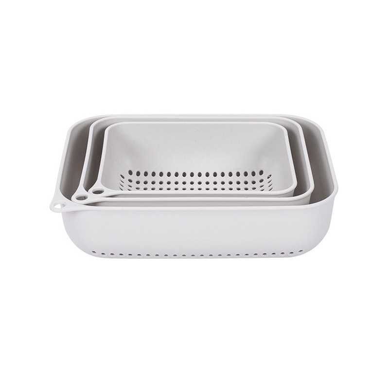 A rectangular kitchen, a three-piece set of fruit and vegetable storage baskets, a draining basket, a plastic sink for washing vegetables, and a creative home fruit wash Item Picture