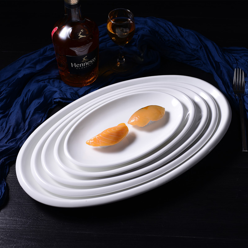 Pure white ceramic plates, fish plates, oval plates, steamed fish plates, large fish plates, vegetable plates, deep fish plates, grilled fish plates, hotel tableware details Picture