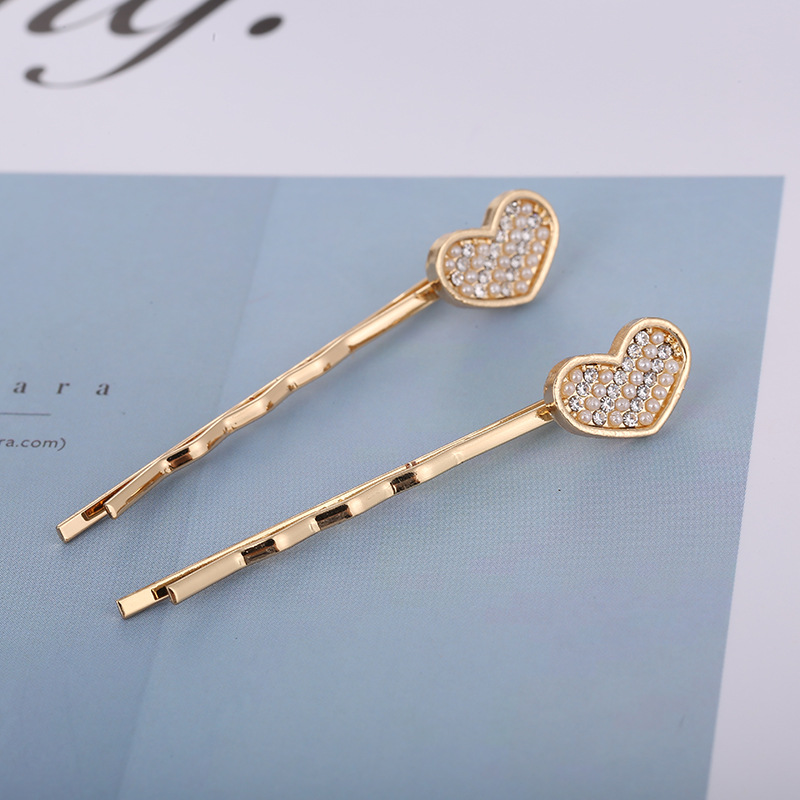 Pearl headwear, Korean style women's hair clips, one-piece clips, fashionable crown, heart-shaped bow tie, diamond-shaped new hair accessories wholesale details Picture