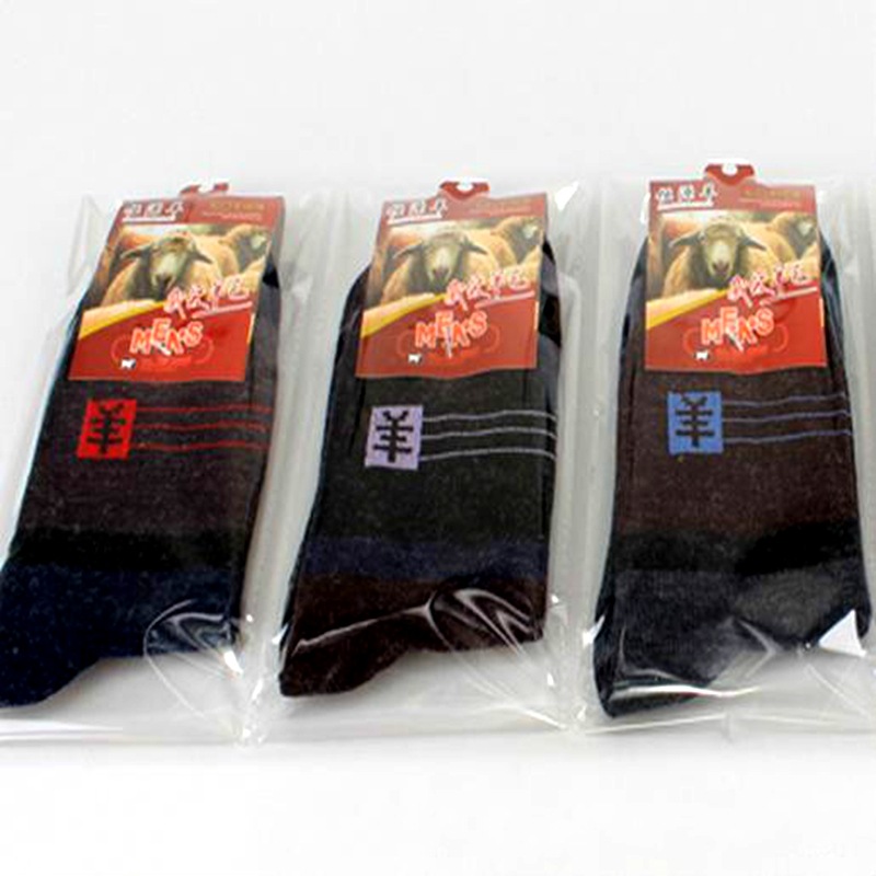 Wholesale of individual packaged men's cotton socks for autumn and winter, wool imitation mixed middle tube, elderly people's street stall Taobao gift socks details Picture