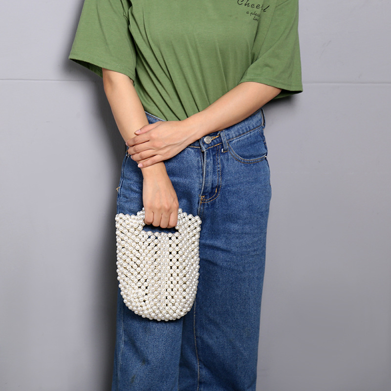 Summer women's bags are selling well on Taobao. Hand-held pearl bags, Instagram-popular hand-woven beaded bags, fashionable decorations, and coin purses details Picture