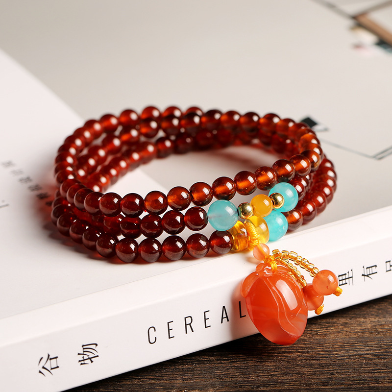 Natural orange-red garnet bracelet with three loops of 5.5mm round beads, paired with a DIY beeswax south red bracelet Specification image