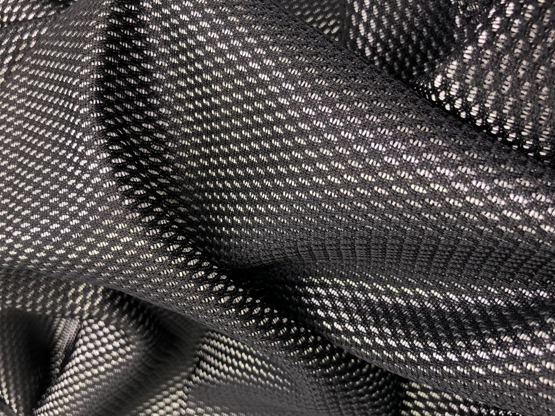 Eco-friendly polyester-polyester two-color mesh fabric for shoes, Mosaic back-attached mesh fabric for laundry bags and luggage, GY185 Application Scenario
