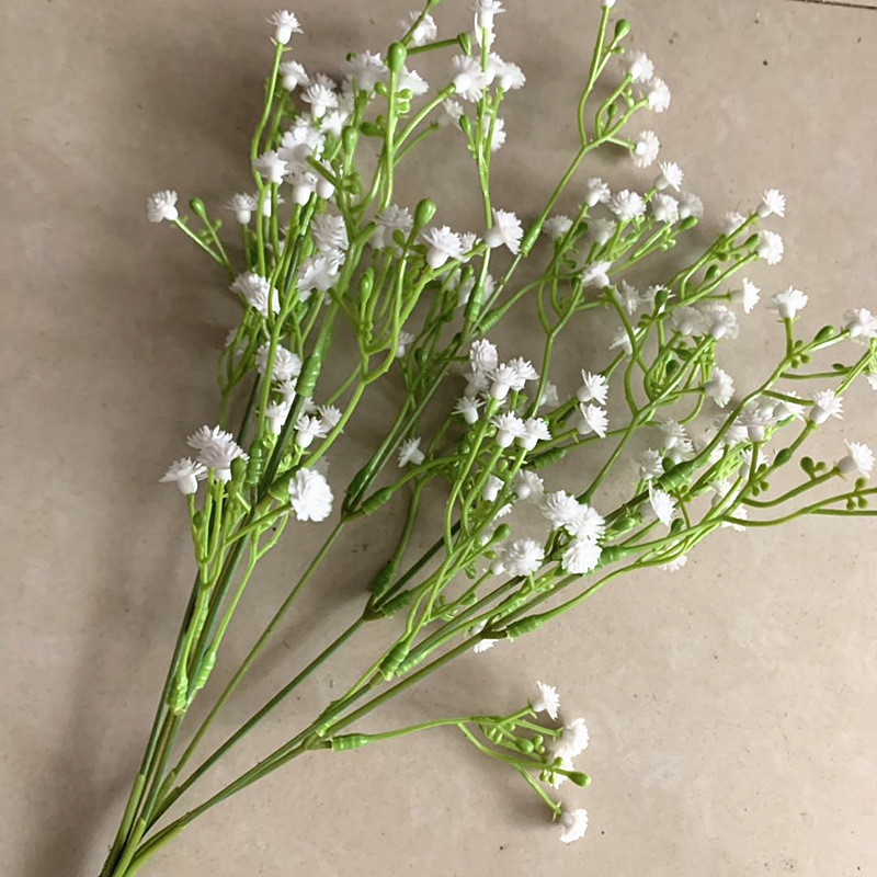 Manufacturers direct sales of silk silk stockings with grass seven-head star simulation plastic eternal life flower home decoration Application Scenario