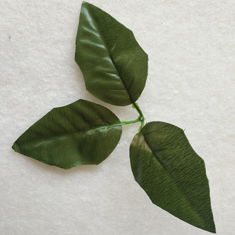 Silk silk stockings flower simulation flower with leaves triangular leaves trigonometric leaves Christmas flower leaves simulation plant with leaves wholesale details Picture