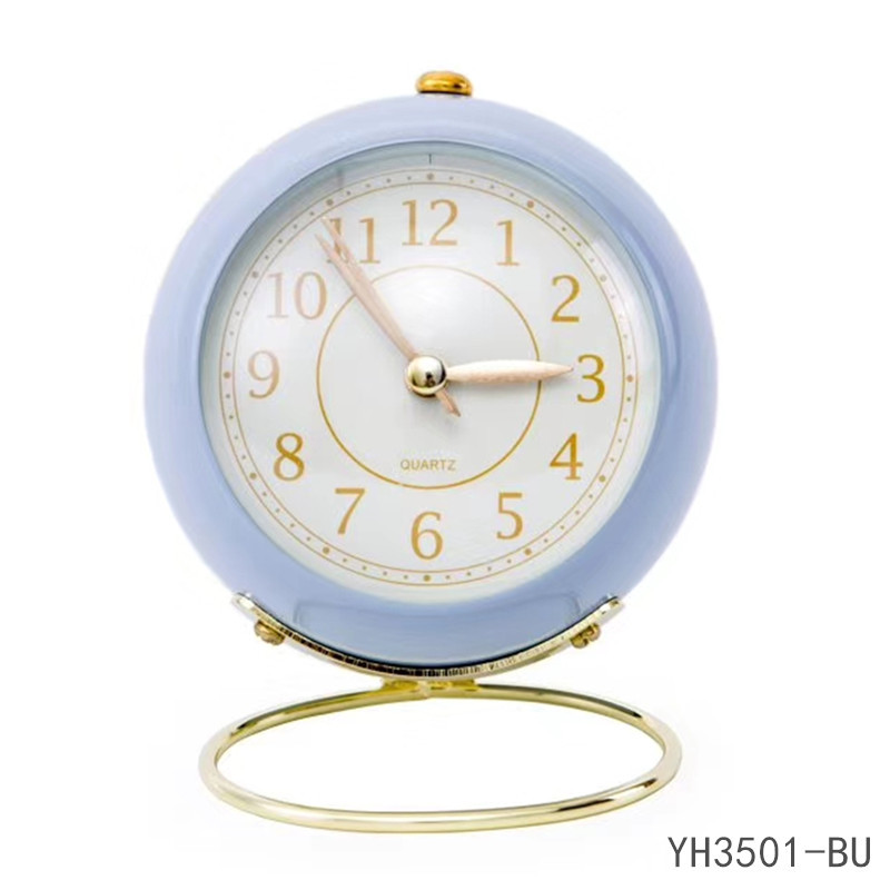 A new type of quartz clock with a silent night light, featuring a convex glass circular base metal table clock and bedside alarm clock details Picture