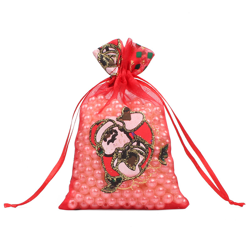 Wholesale Christmas patterned drawstring gauze bags, Christmas gift drawstring gold-embossed gauze bags, Christmas gift storage cloth bags Application Scenario