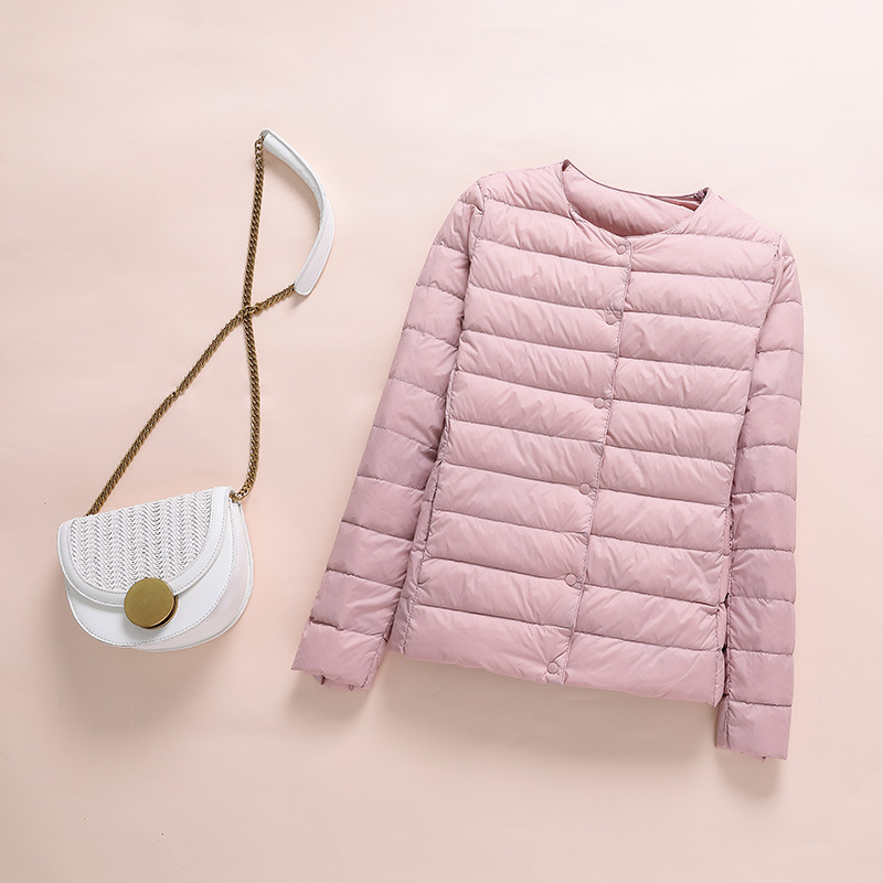 The 2019 autumn/winter new women's collarless down jacket is a light, thin, convenient, round-neck, slim and short women's down jacket details Picture