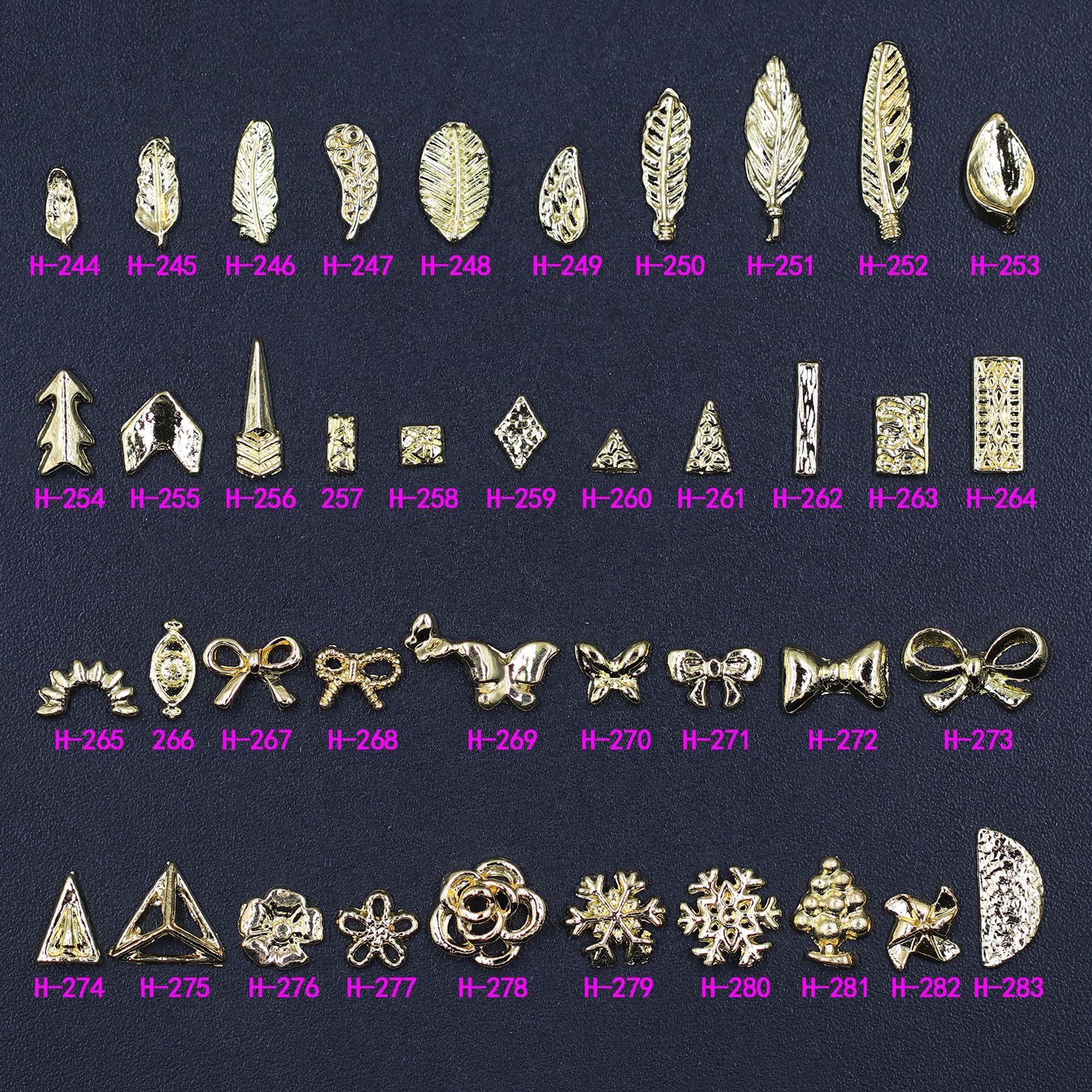  时尚新款美甲合金饰品指甲金属装饰树叶羽毛蝴蝶结雪花麻点三角形美甲钻饰品 美甲饰品