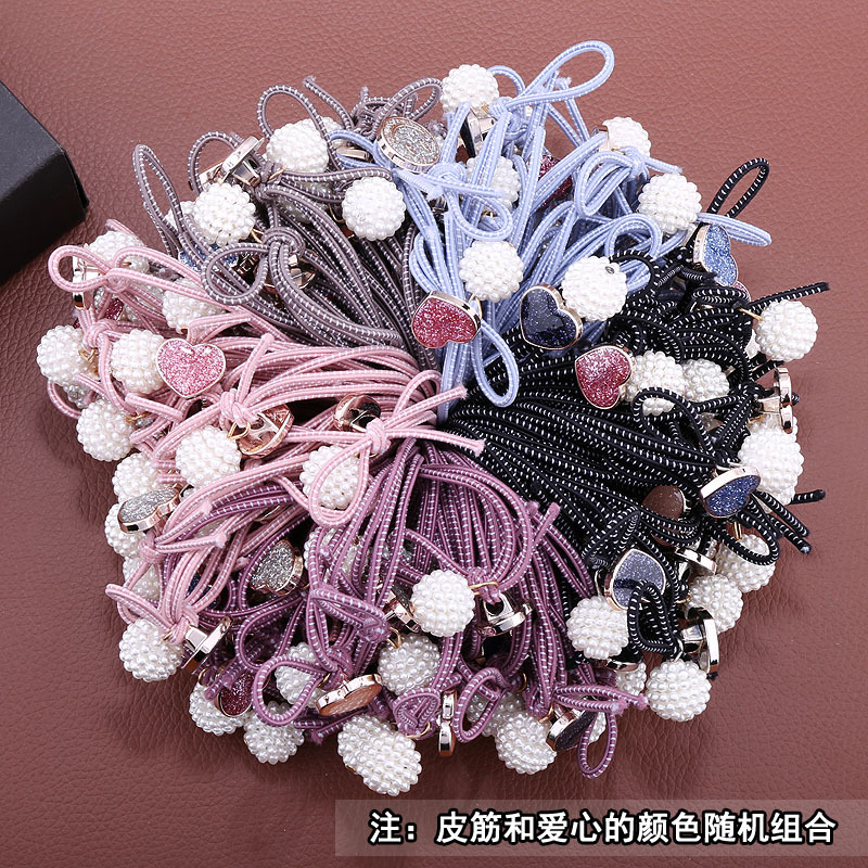 New Korean version pearl ball hair band, oil-dripping heart-shaped smiling face hair tie, rubber band for tying hair and tying knots, 2 yuan Application Scenario