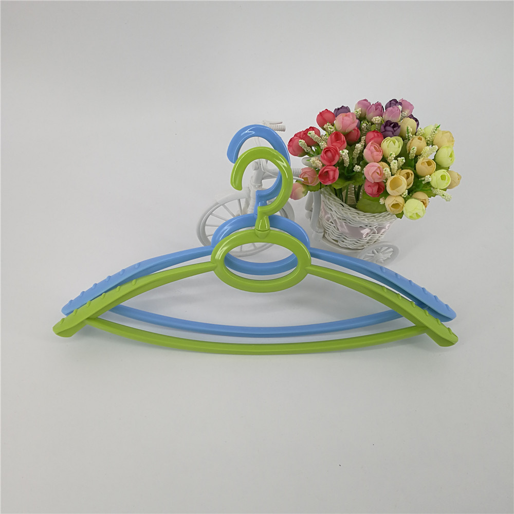 Colgador de plástico creativo arco redondo engrosado antideslizante no traza seco y húmedo doble uso colgador de hombro ancho puede rotar la ropa del hogar colgante