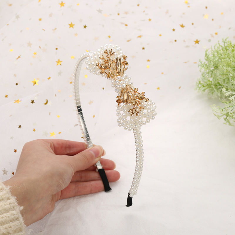 Korean version of the popular hair band, women's headband, InS-style accessories, cat ears, pearl bow hair accessories, domestic independent wholesale details Picture