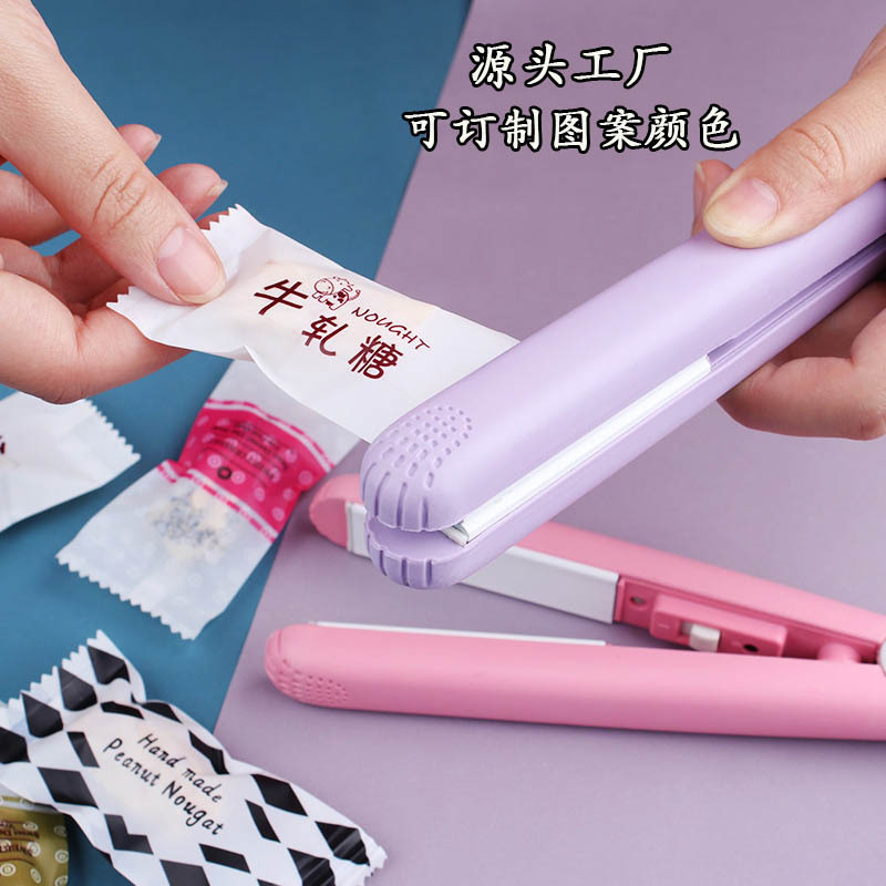 Wholesale of small household mini portable nougat sealing machines, snack snowflake pastry packaging bags, and candy wrapper plastic sealing machines