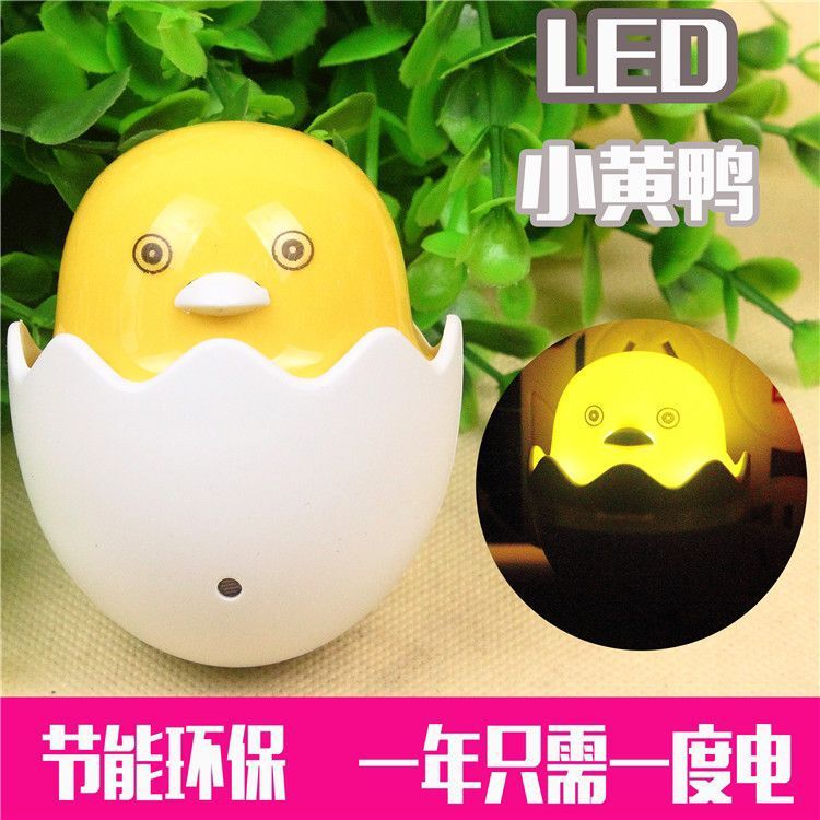 The Little Yellow Duck LED light-controlled sensor light is a novel, unique and creative smart night light for home use details Picture