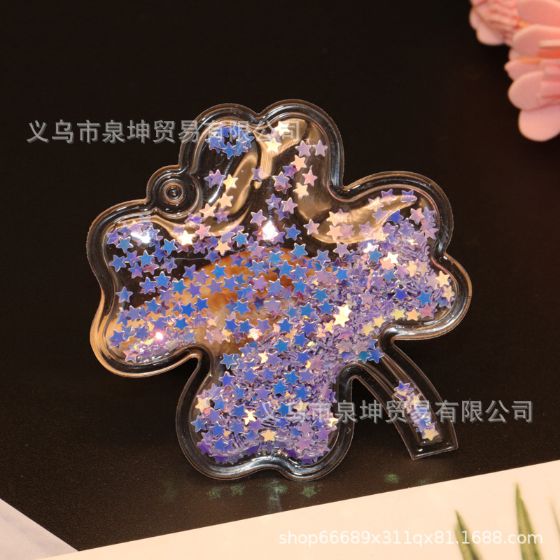 Factory PVC cartoon transparent flowing sand golden four-leaf clover key buckle hair band mobile phone case children's DIY accessory Specification image