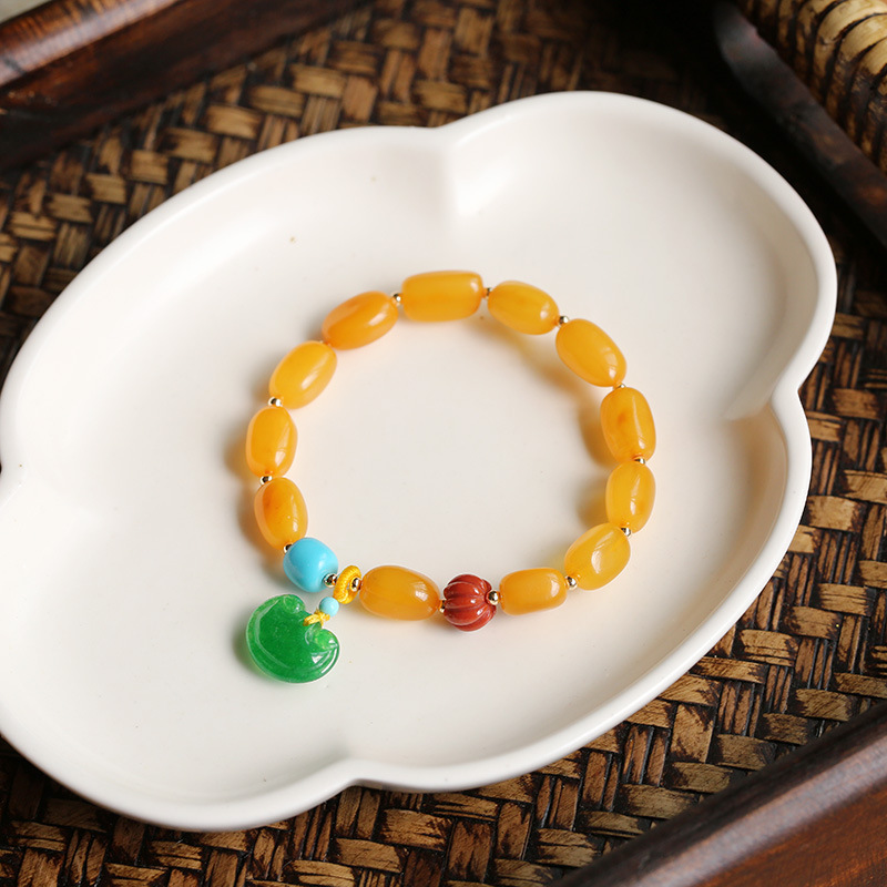 Factory direct sales of natural amber portable bracelets, safety locks for safety and good fortune. Wholesale of classic amber bracelets