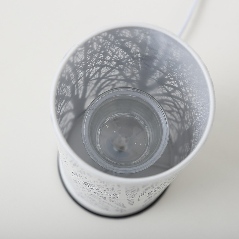 Simple and creative home aroma lamp, ironwork plug-in, room and living room bedside lamp, round tree electronic wax melting device Application Scenario