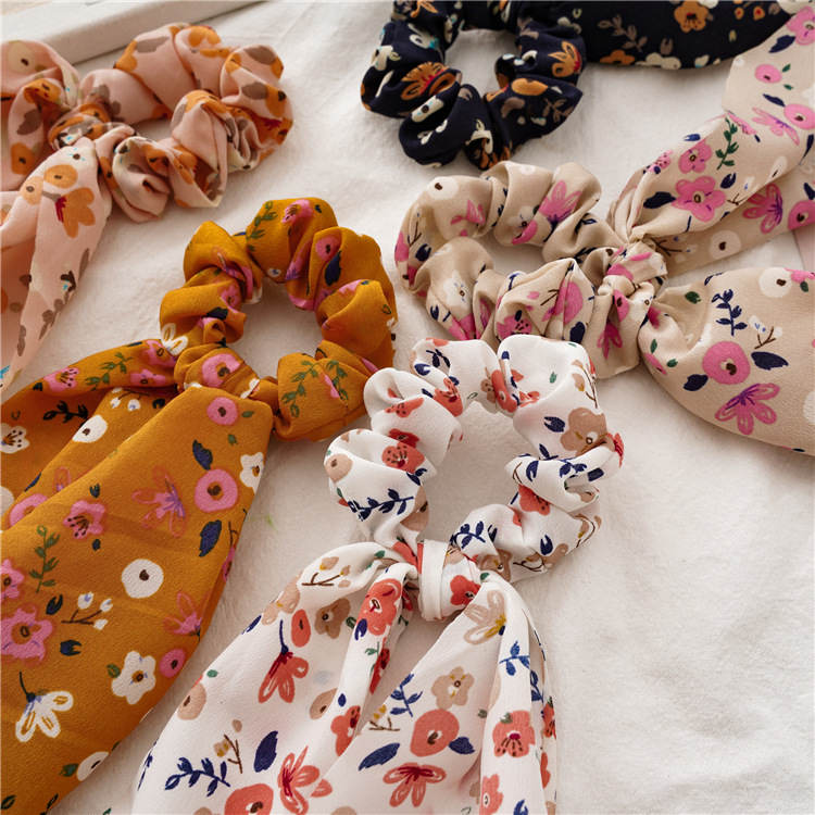 A new Korean version of floral and fresh hair tie with a ribbon, a versatile female accessory with a ponytail and a large intestine ring, and a sweet Japanese and Korean Instagram head accessory details Picture
