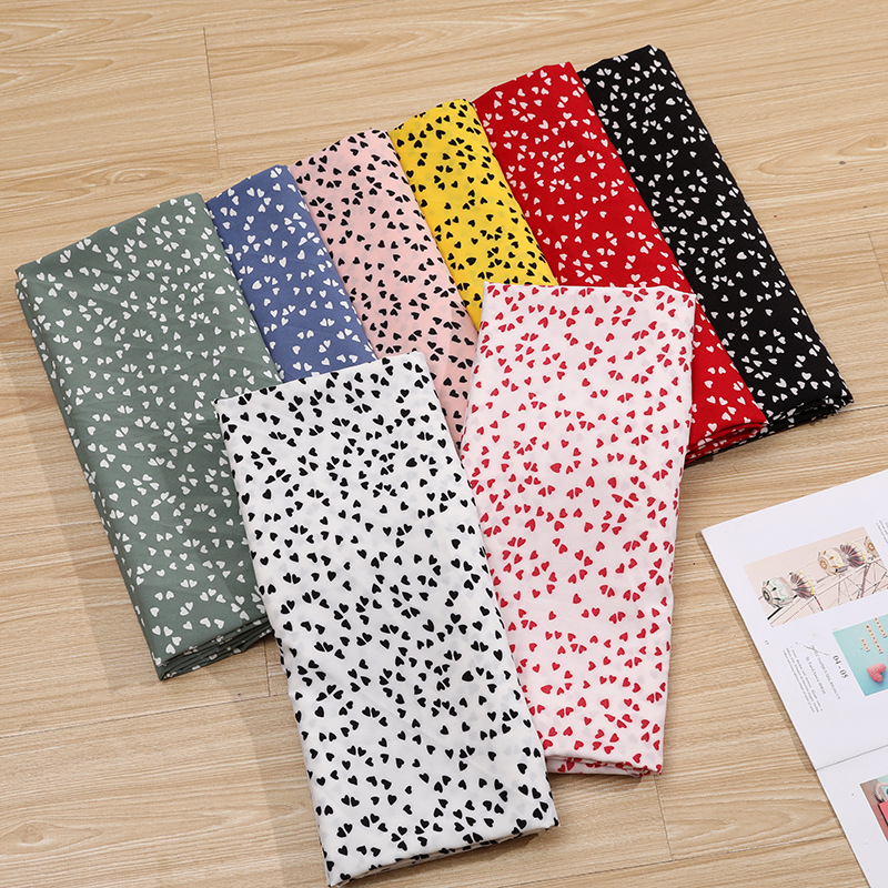 Spring and summer new dress: Chiffon plain weave fabric, heart-shaped printed polyester fabric, four-sided elastic clothing fabric in stock details Picture