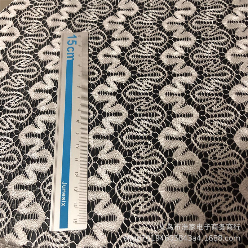 Factory direct sales of small dragon flower lace fabric for children's clothing, dresses, clothing fabrics, home textile accessories and custom orders Application Scenario