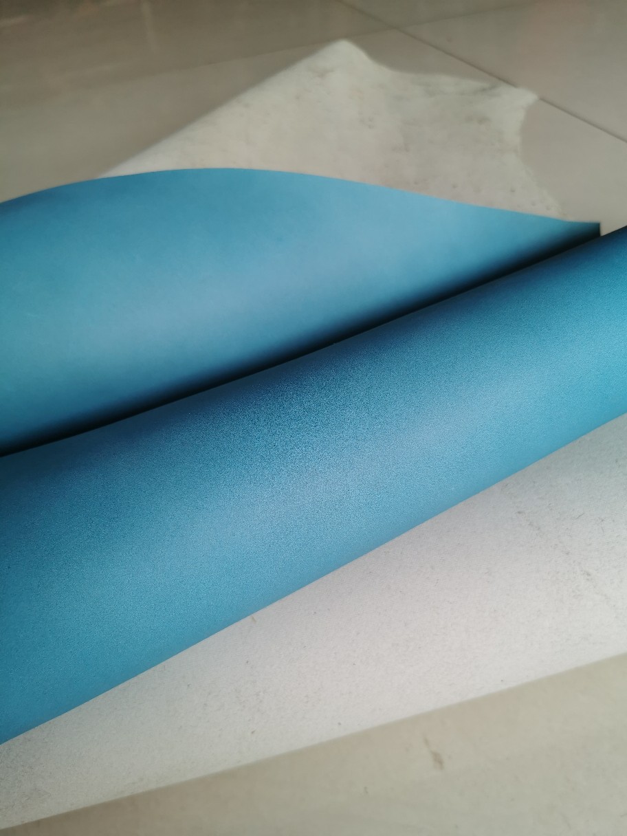 Yiwu Ha Niu Leather Industry offers custom-made top-grain cowhide, blue matte leather, and colored matte leather with spray coating