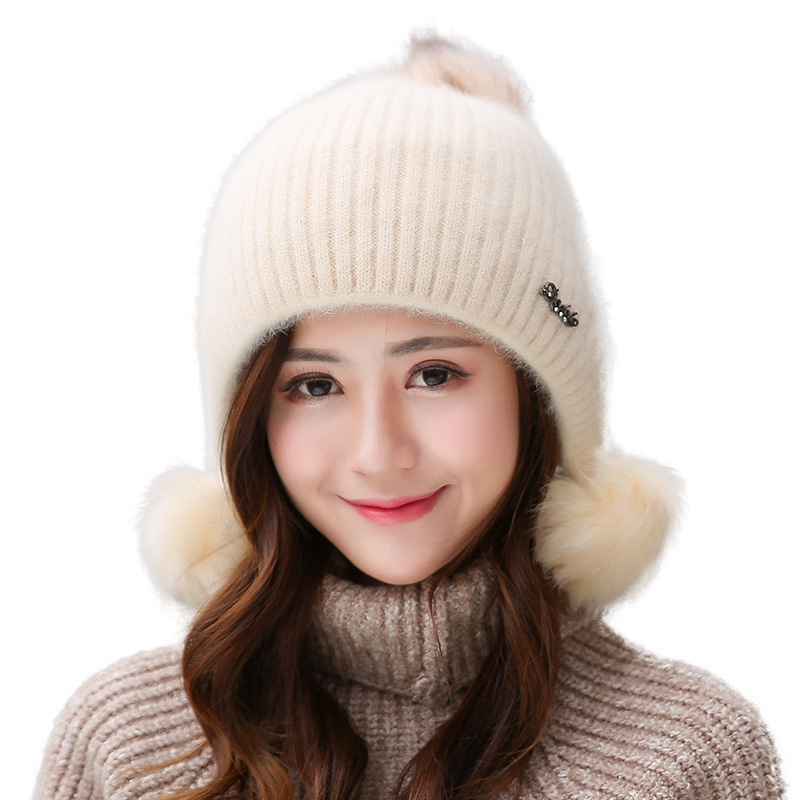 The winter Korean version of the "Hat Girl" is sweet and cute. It's versatile for students and thickened for warmth in autumn and winter. It's a knitted rabbit fur hat for girls Item Picture