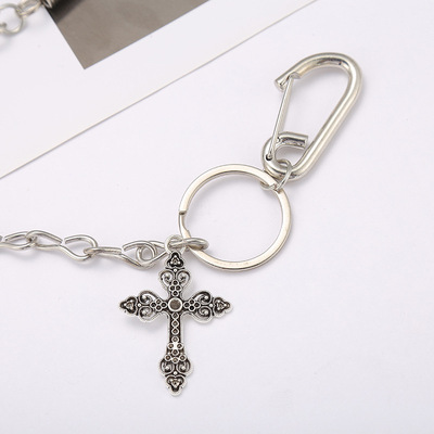Trendy and personalized pants paired with chain hangers are fashionable and versatile. Metal cross chain hangers are available for wholesale from street manufacturers details Picture