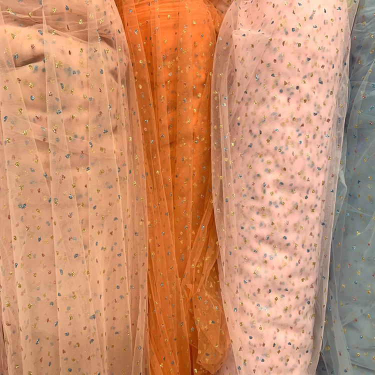 Wholesale of knitted mesh fabric for clothing, toys, puffy skirts, headwear, hair accessories, butterfly knot mesh fabric, and three-color mesh gauze Specification image