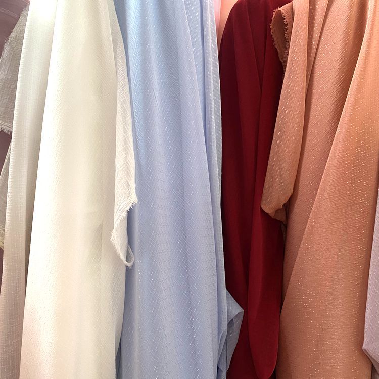 Wholesale of new polyester clothing, skirt, yarn fabric, toys, headwear, hair accessories, scarf fabric, dot star yarn and wrinkled fabric