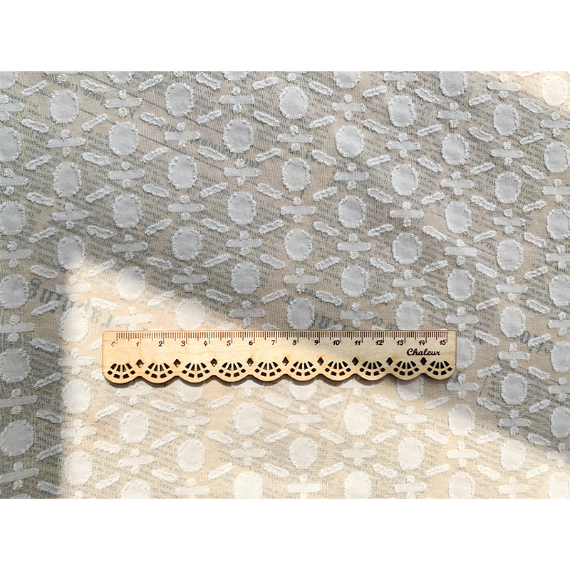 弘利科技【新品】100dD雪纺几何花型提花剪花面料时装女装上衣衬衫长袖布白底实物图