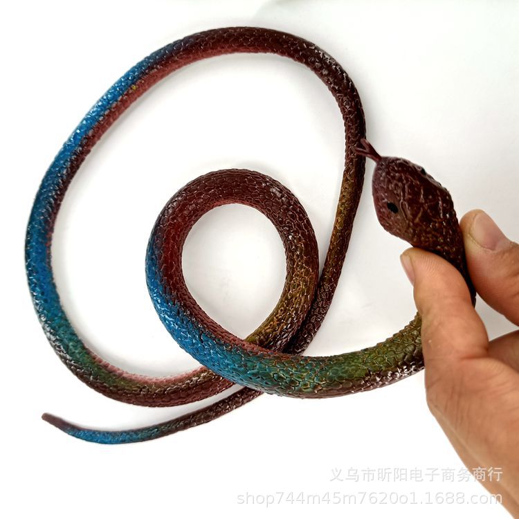 Rubber snake 75cm toy snake is selling well. It's a creative soft rubber snake toy that simulates pranks and scares people. It's available at a street stall for 1 yuan details Picture