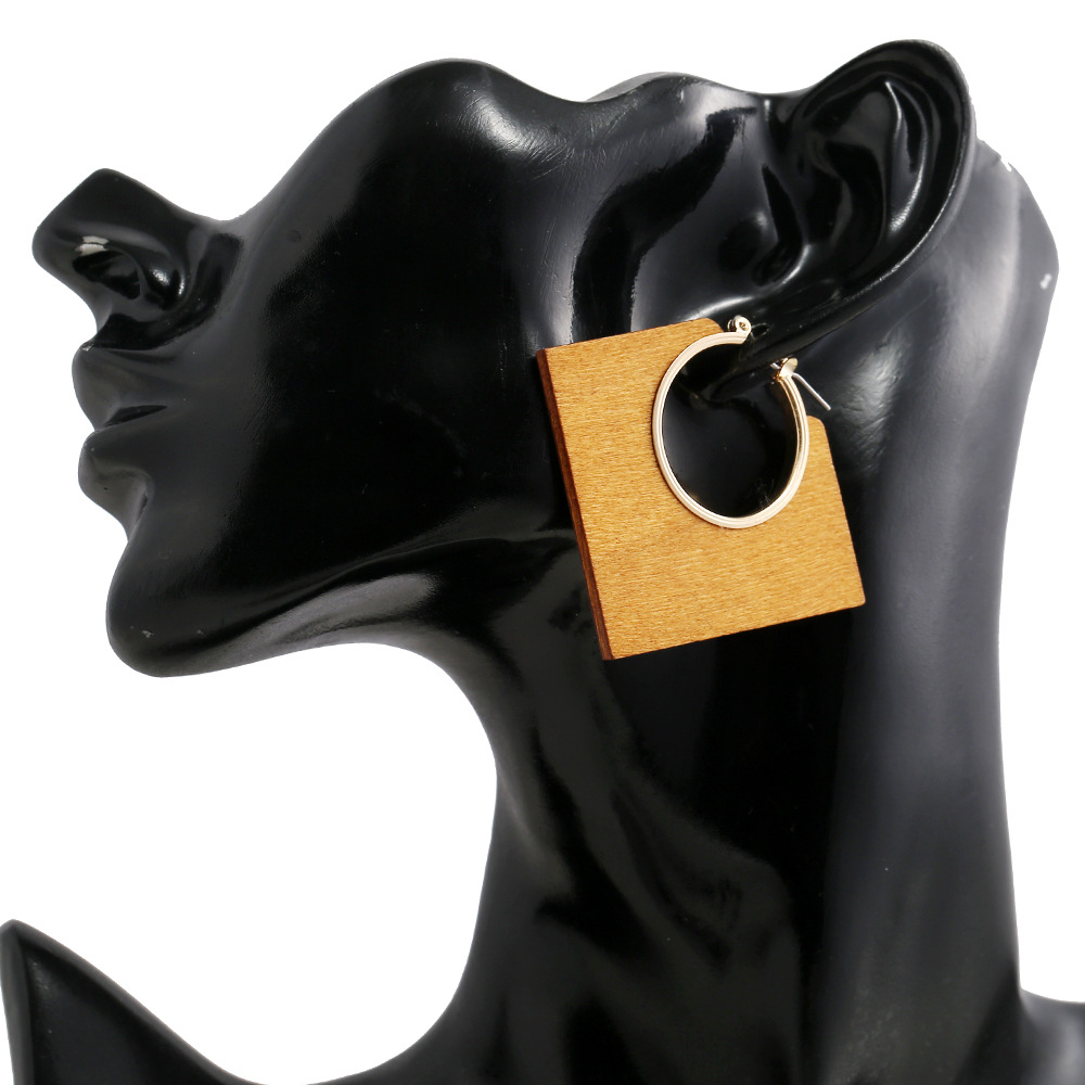 Cross-border exclusive European and American new ear rings, creative geometric classic solid color solid wood diamond-shaped hollowed-out alloy earrings and earrings Application Scenario