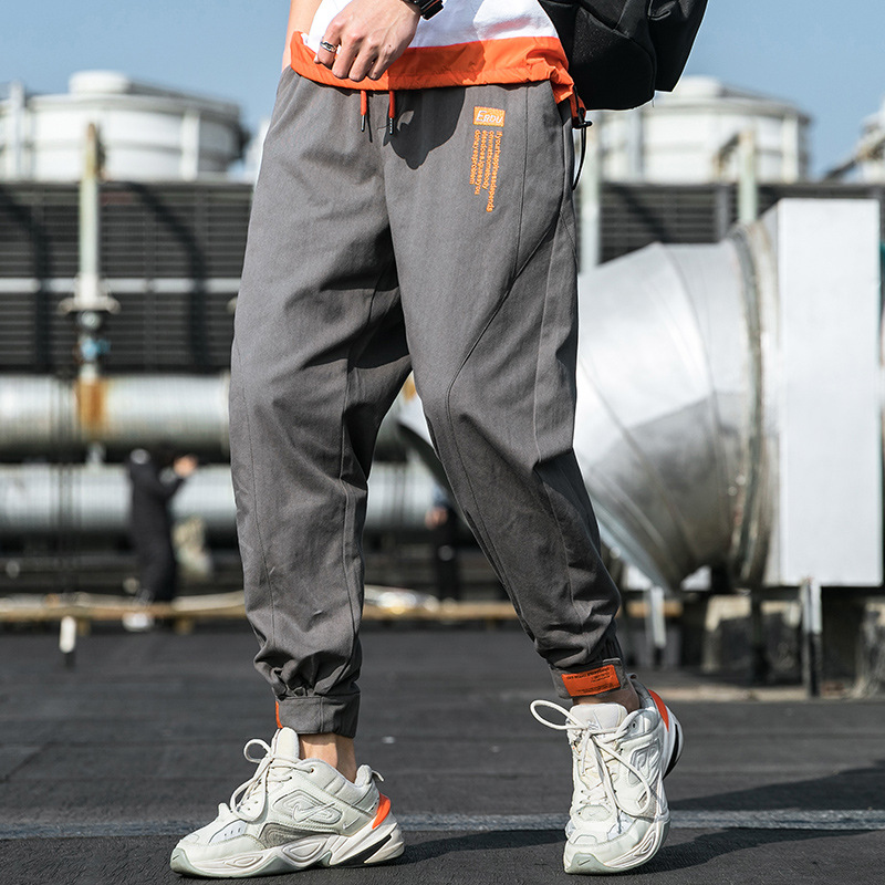 One-piece consignment of 2021 Spring and Autumn new men's black casual pants, men's personalized printed and trendy workwear pants for teenagers details Picture
