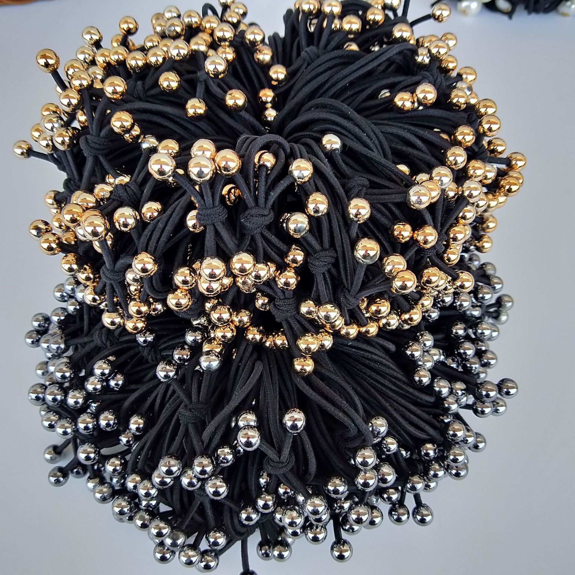Wholesale of popular accessories: gold and silver beads, hair ties, 3-strand rubber bands, cute and trendy hair accessories, 1-yuan accessories wholesale details Picture
