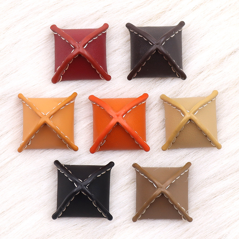 Autumn and winter leather black irregular-shaped zongzi buttons, high-end leather jackets, woolen windbreakers, leather buttons, wool coats, coat buttons
