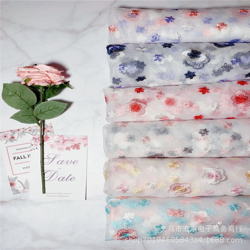 Wholesale and customization of home textile and clothing accessories, embroidered Daisy mesh fabric, skirts, wedding dresses, lace fabric