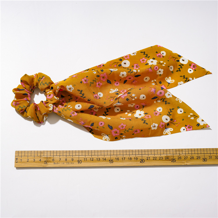 A new Korean version of floral and fresh hair tie with a ribbon, a versatile female accessory with a ponytail and a large intestine ring, and a sweet Japanese and Korean Instagram head accessory Application Scenario