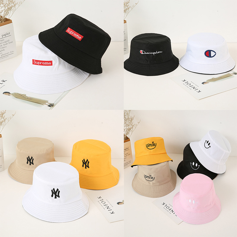 Double-sided fisherman's hat, solid color smiling face, chrysanthemum letter sun hat, outdoor sun protection hat, sun hat for children wholesale