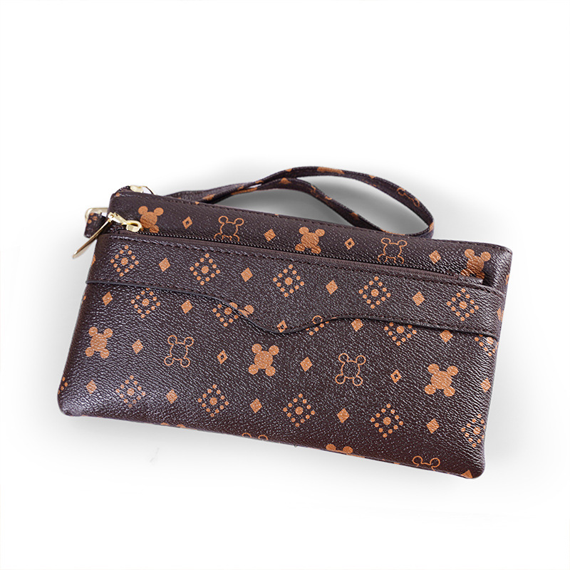 竖款女士手拿包女式长款钱包白底实物图