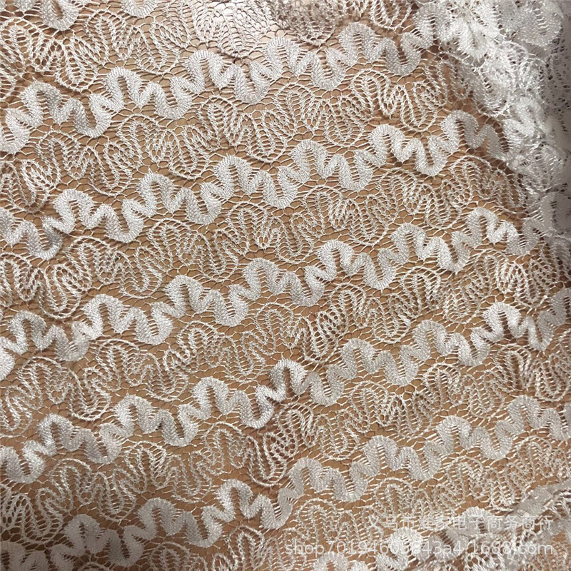 Factory direct sales of small dragon flower lace fabric for children's clothing, dresses, clothing fabrics, home textile accessories and custom orders