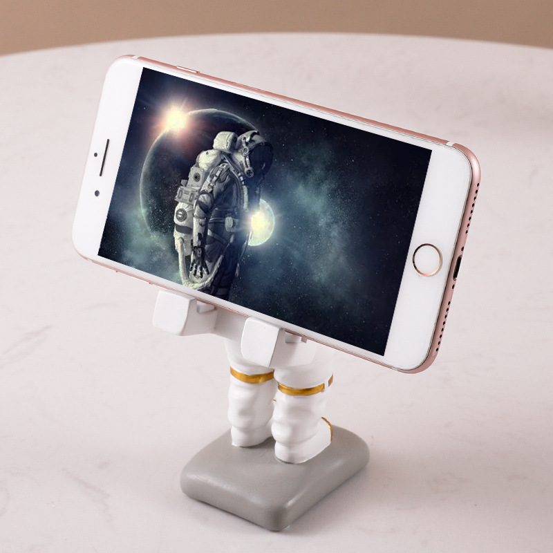 Lazy person's phone stand, creative phone stand, bedside phone stand, creative space hand phone base, cute phone stand details Picture