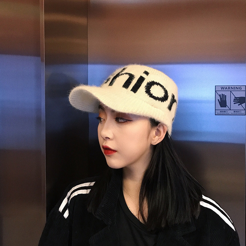 The hollow top woolen cap is a winter Internet celebrity with a unique and fashionable personality. It's a Korean style versatile new knitted baseball cap with letters details Picture